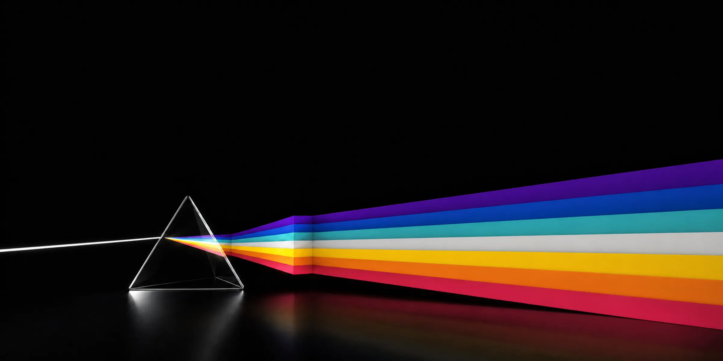 A prism splitting a beam of white light into the full spectrum